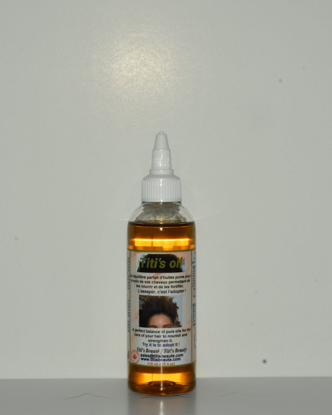 Titi's oil 4 oz Format